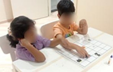 Children collaborating on a coding activity